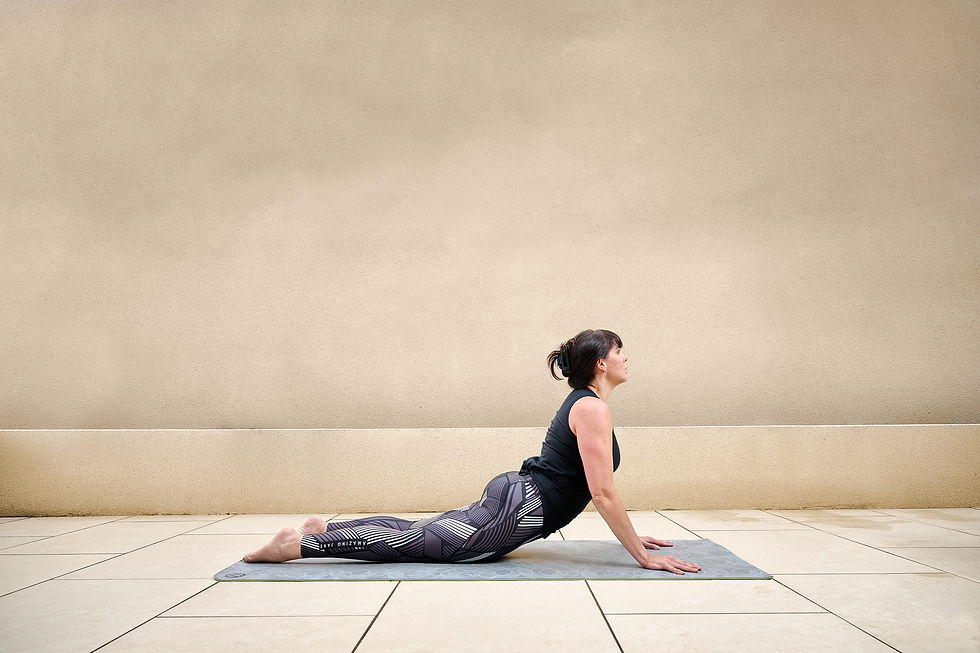 Laura in seal pose.