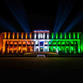 Armed Forces Medical College (AFMC) Pune illuminated in the Indian tricolour for 15 August Independence Day celebration with architectural lighting designed by Dreampoint Studios.
