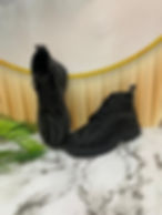 Black high-top shoes