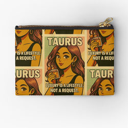 Taurus zodiac girl zipper pouch featuring a pop-art illustration of a stylish woman with wavy brown hair, hoop earrings, and a perfume bottle. Text on the design reads “Luxury is a lifestyle. Not a request.” Perfect for storing essentials with effortless glam and grounded elegance. ♉💛