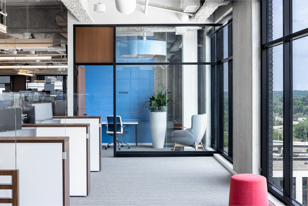 Open office view to a shared private office; unassigned office.