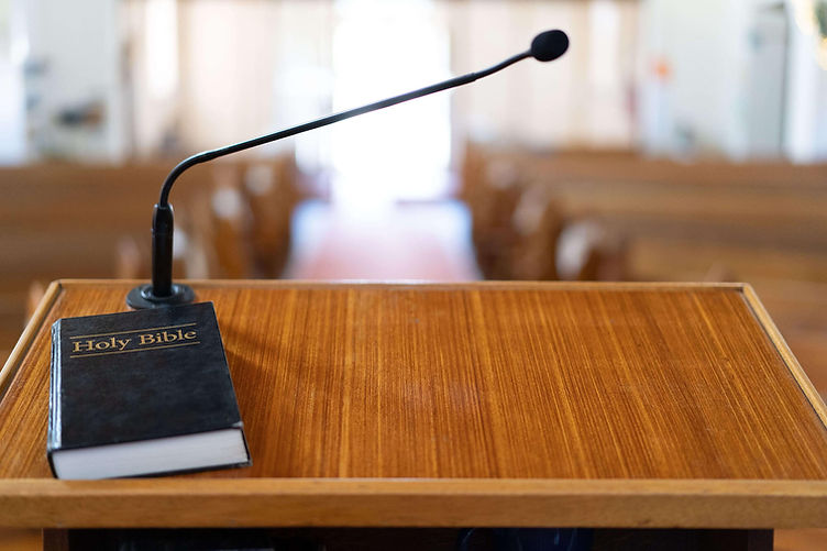 closeup-shot-of-a-wooden-pulpit-with-a-microphone-2025-02-02-20-23-59-utc (1) (2) (1).jpg