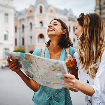 Beautiful girls looking for direction in the city