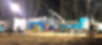 View of contractors using heavy equipment for boring