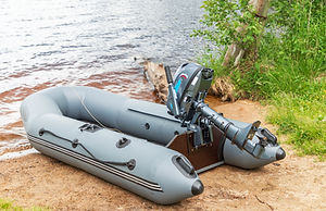 Empty inflatable boat with motor