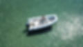 Aerial photo of small inflatable speed boat