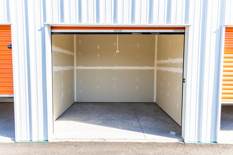 Empty storage shed with its gate opened