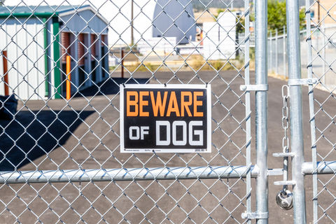 A sign saying Beware of Dog
