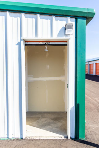 Empty small storage space with hanging lights