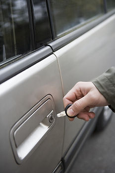 Man using car key