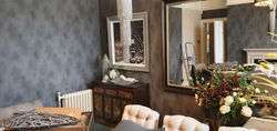 dining room grey wallpapered wall