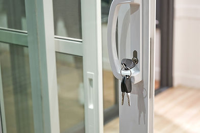 key left on white door