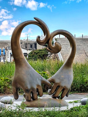 A statue of two joined hands in South Korea