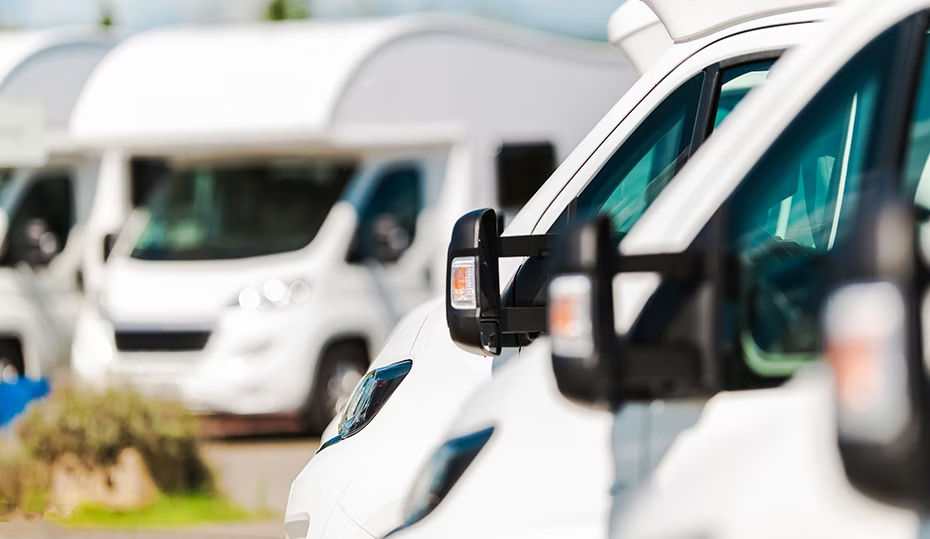 RVs for sale on a dealership lot in Texas.