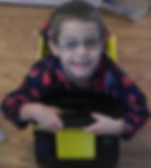 November 17, 2013: Brayden in a toy dump truck.