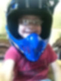 June 28, 2013: Brayden wearing his four-wheeler helmet!