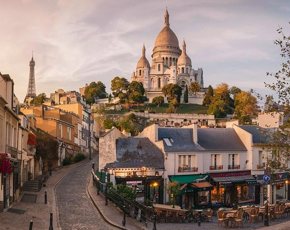 Sacre-Coeur Basilica with Eiffel Tower in the distance