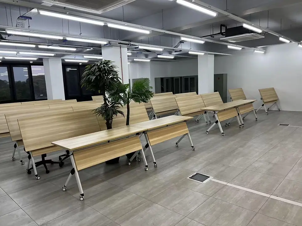 Completed training room setup in Bukit Mertajam with foldable and movable training tables arranged in a large open space