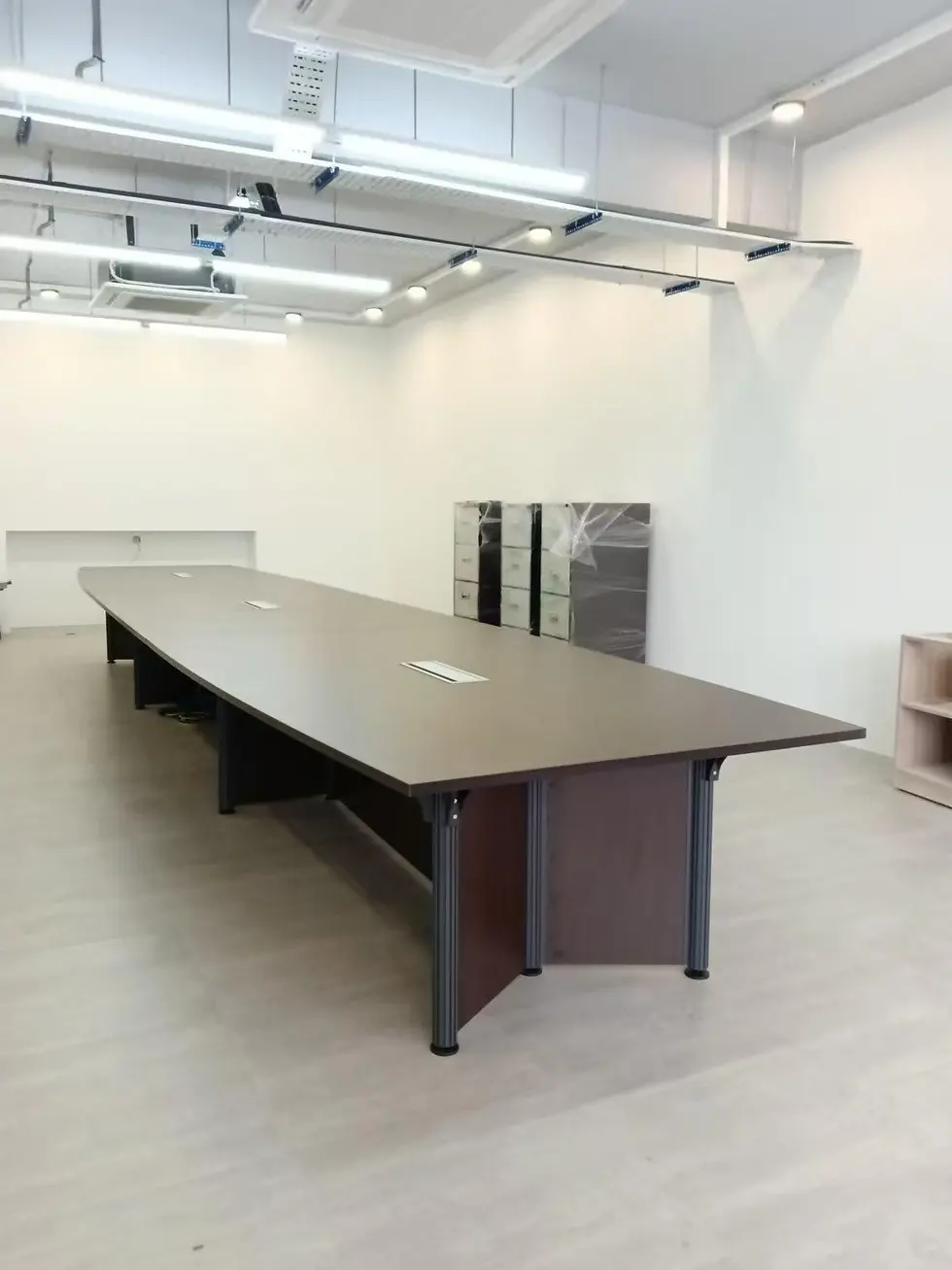 Completed meeting room setup with a large central table seating up to 25 people in Bukit Mertajam office installation project