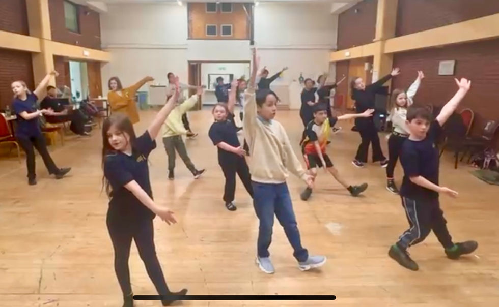 Our Munchkins rehearsing!