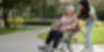 caregiver assisting elderly