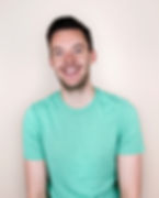A happy young man that has joined The Wellbeing & Recovery Collective.
