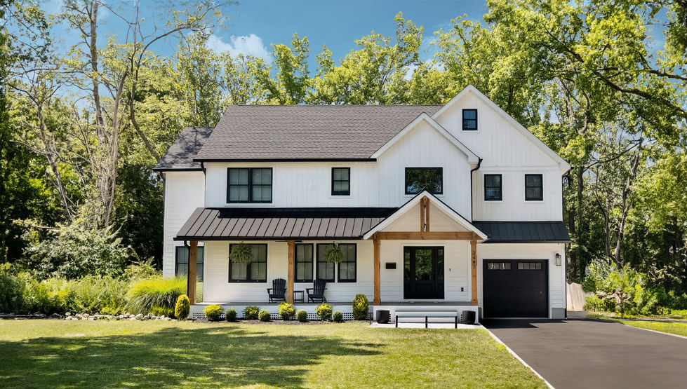 Elegant exterior of a custom luxury home by The Kanstrukt Group