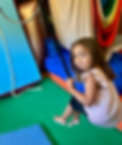 little girl swinging on bungee swing.