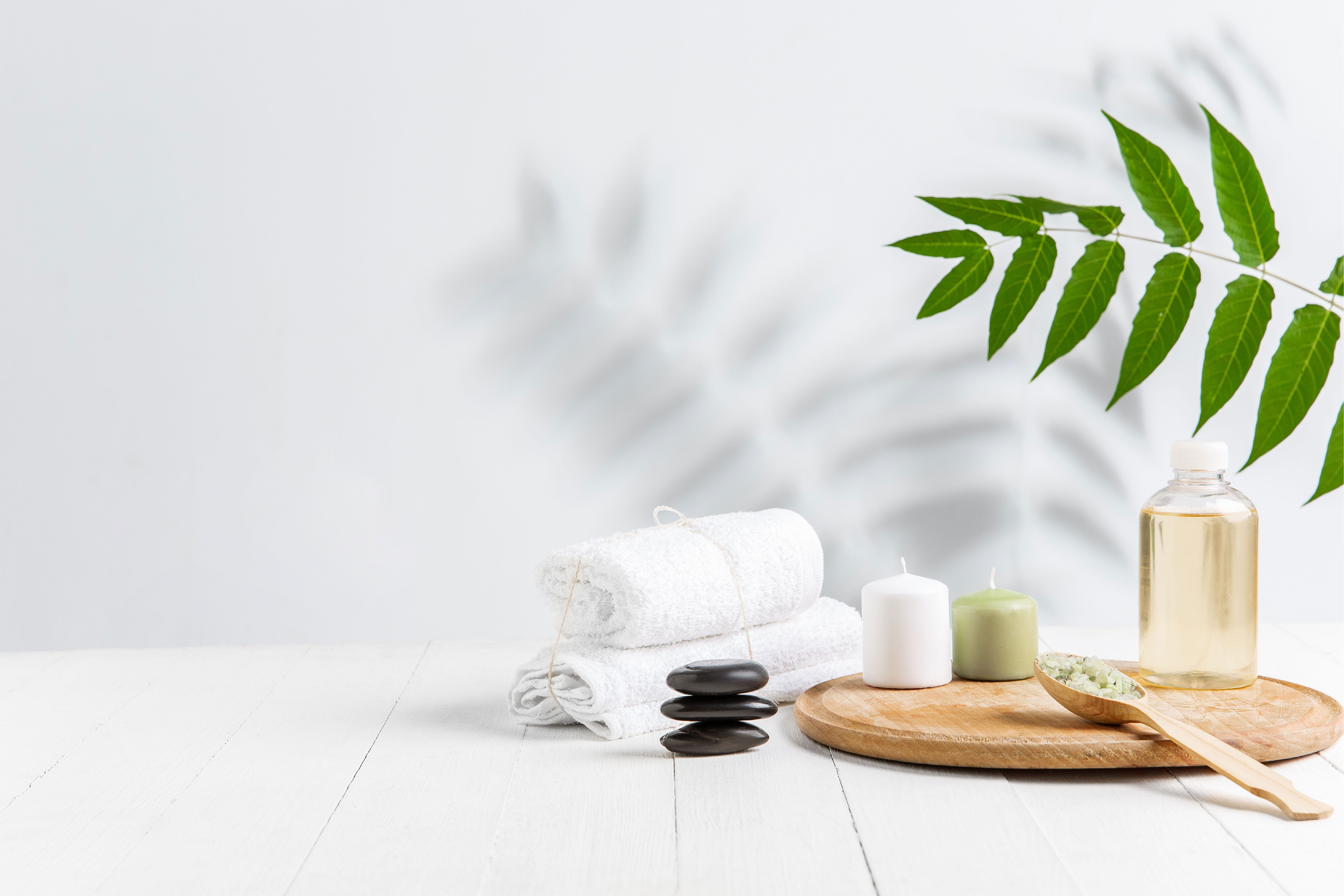 Beautiful spa composition on a massage table, original Lamar House Salon website image