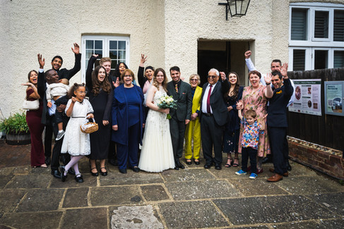 Group shot of whole family during a wedding in Ware.