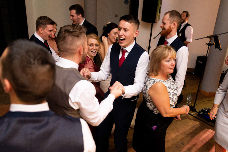 Guests during evening disco having lots of laugh and fun while dancing