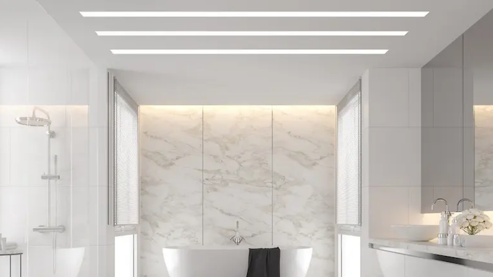 Custom plaster ceiling with curved L box edge and center fan