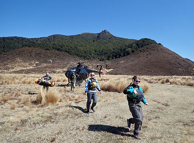 Unloading heli at Boyd Airstrip