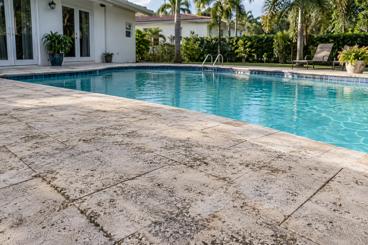 Residential swimming pool and surrounding stone deck