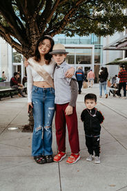 photo of sweet 16 girl with her two brothers standing in front of valley fair mall, San Jose