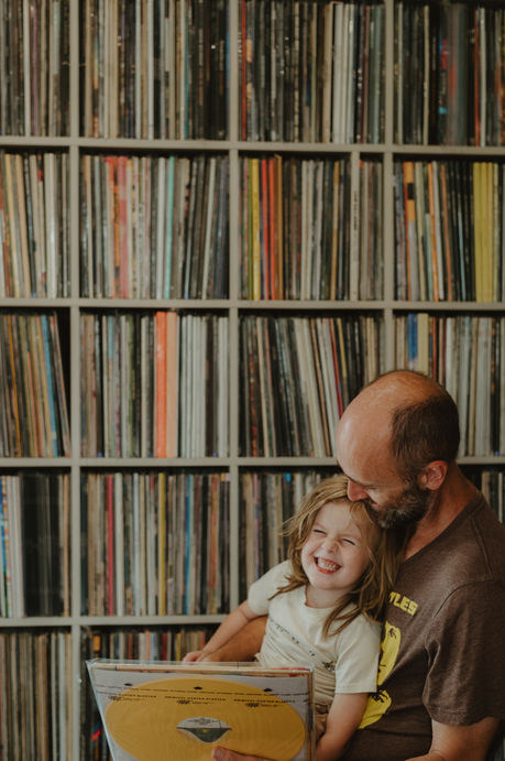 Father and son with record collection-Tela Records bucks county sell your records