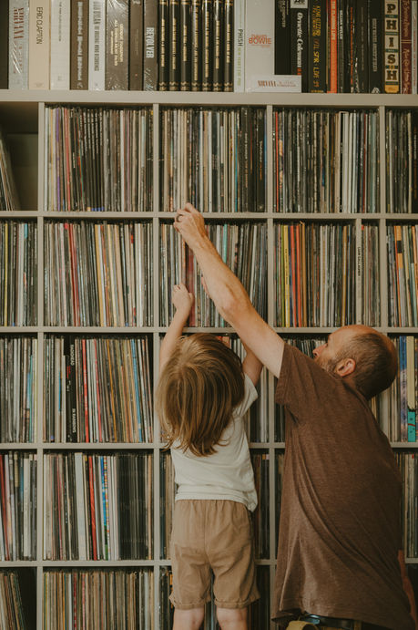 Father and son with record collection-Tela Records bucks county sell your records