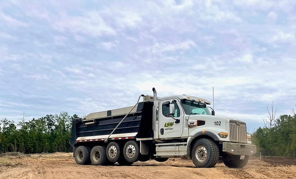LeMaster Site Work dump truck at a site prep location.