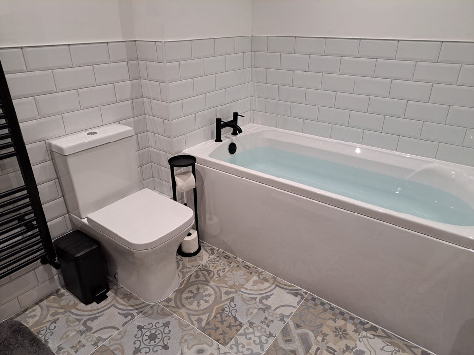 new toilet and bath fitted