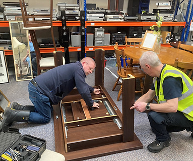 Staff working on furniture
