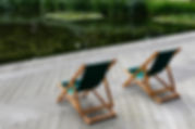 Deckchairs on wooden decking