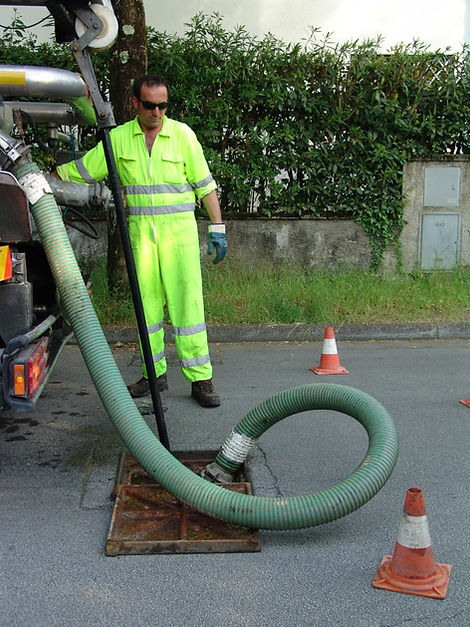 Work emptying a septic tank