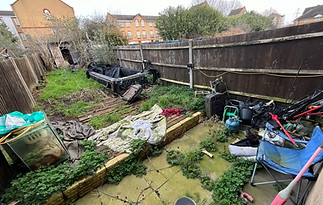 Back garden full of rubbish