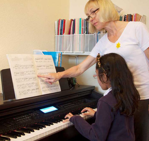 Girl learning keyboard