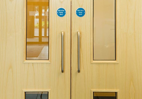 Close up of modern wooden office doors