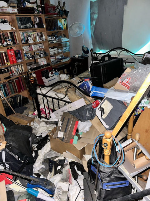 Room full to the brim with rubbish