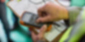 Electrician using a voltage meter