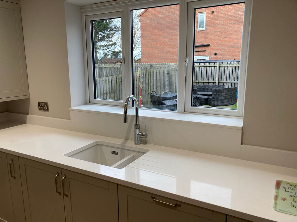 kitchen sink beside a window