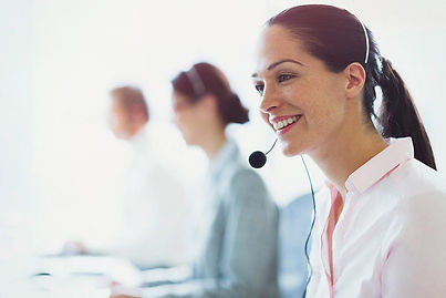 Smiling businesswoman talking on the phone with headset