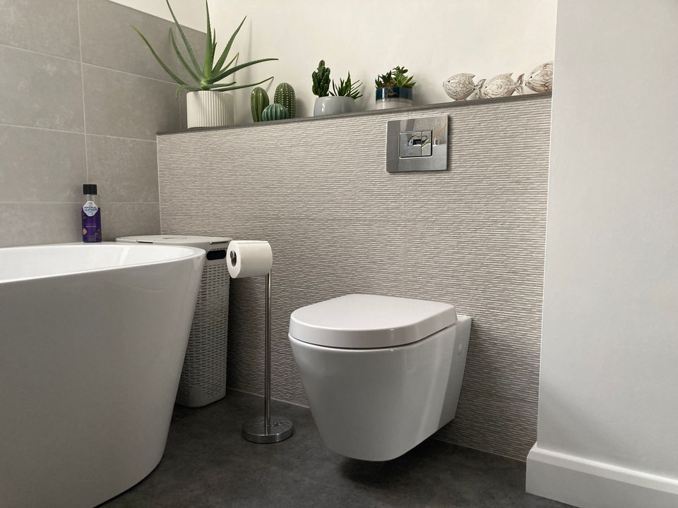 new bathroom suite with wall integrated toilet